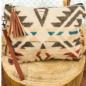 Abilene Tassel Crossbody Clutch, Beige. Brand New.